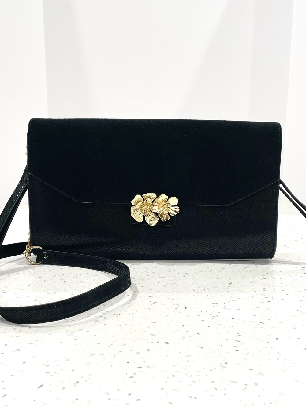 White House Black Market Black Crossbody with Gold Floral Accent